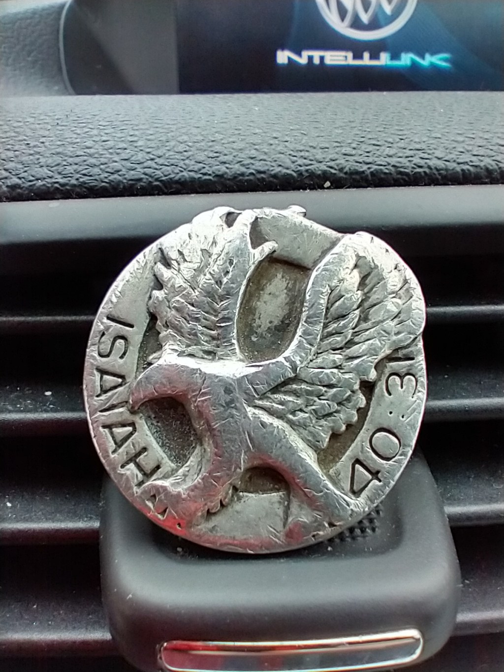 Isaiah 40:31 and a necklace&nbsp;medallion.